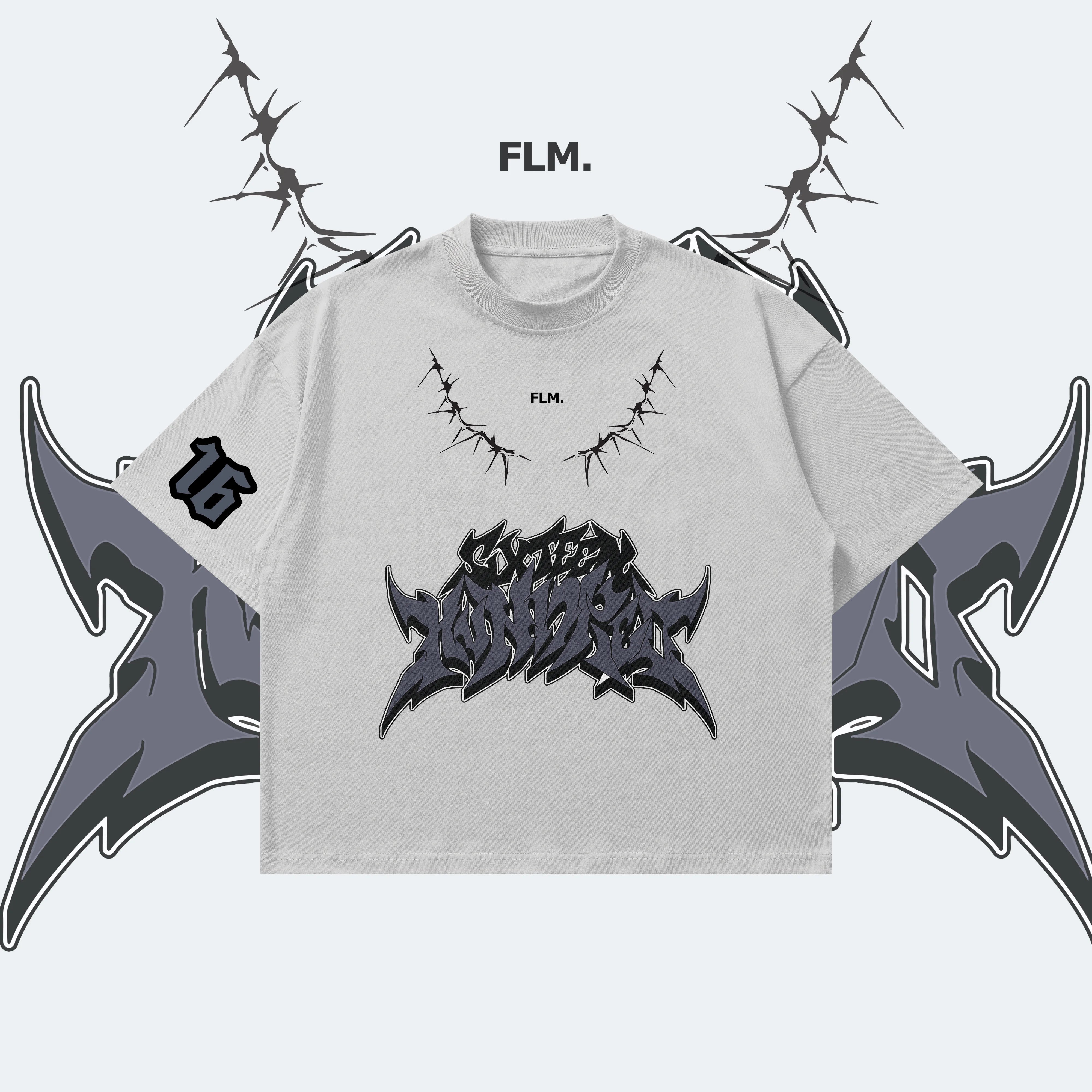Gray t-shirt with black graphic design and 'FLM.' text, surrounded by abstract shapes and barbed wire.