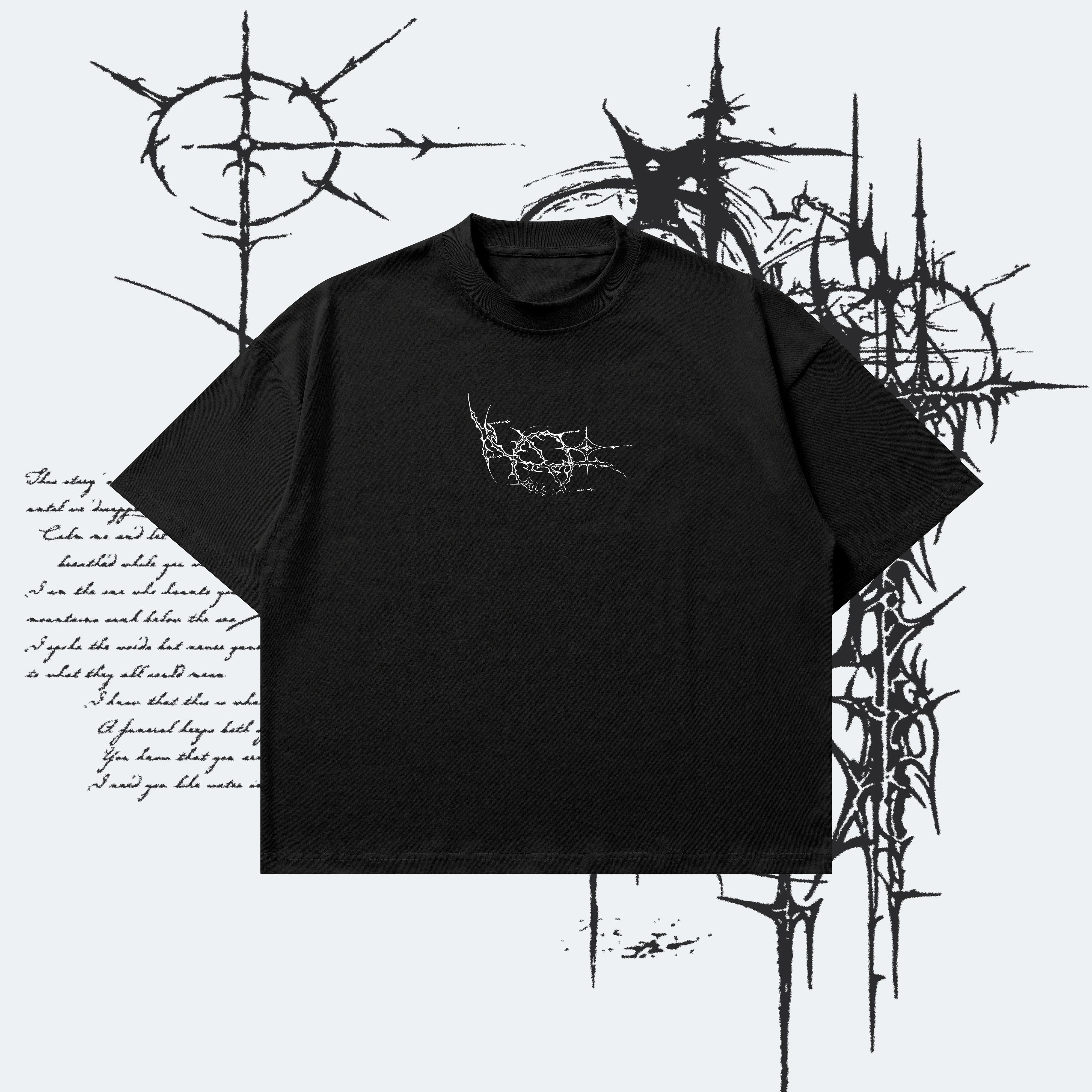 Black t-shirt with a white graphic design on a white background with black abstract elements.