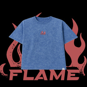 Blue t-shirt with red flame design on a black background